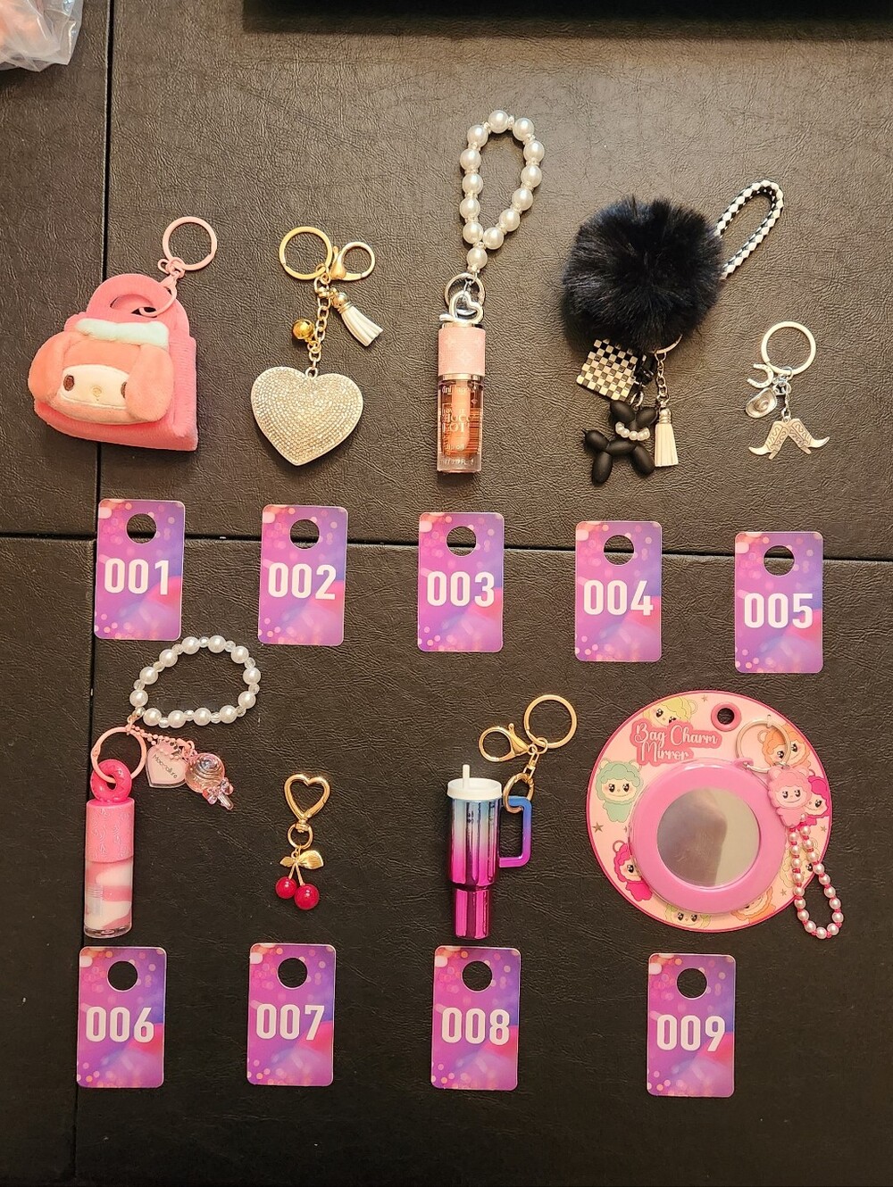 1 Piece-Assorted Pink and Black Keychain Lot - . Buyers Choice.